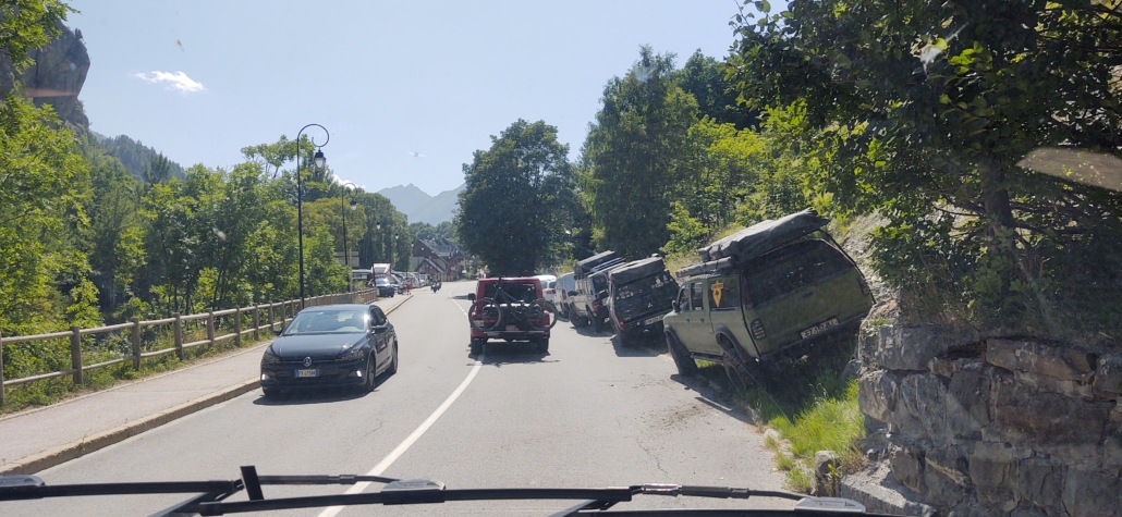 4x4s parked along the road in Valloire