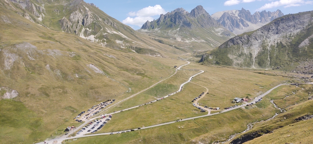 4x4s wild camping below the road to the Col du Galibier from Valloire