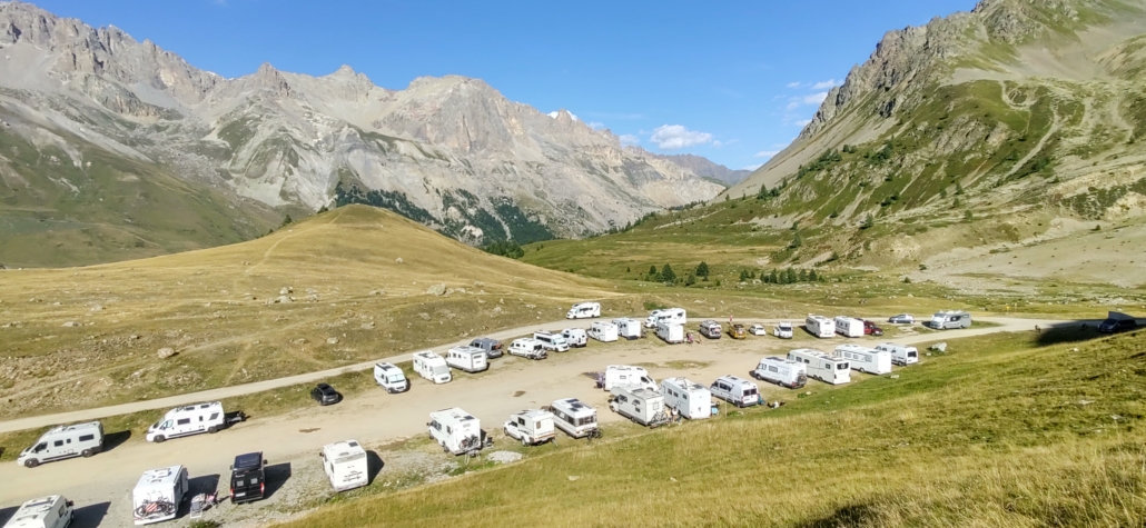 The popular tolerated overnight motorhome parking area at the Col du Lautaret. There are no services here, come with empty waste tanks folks.