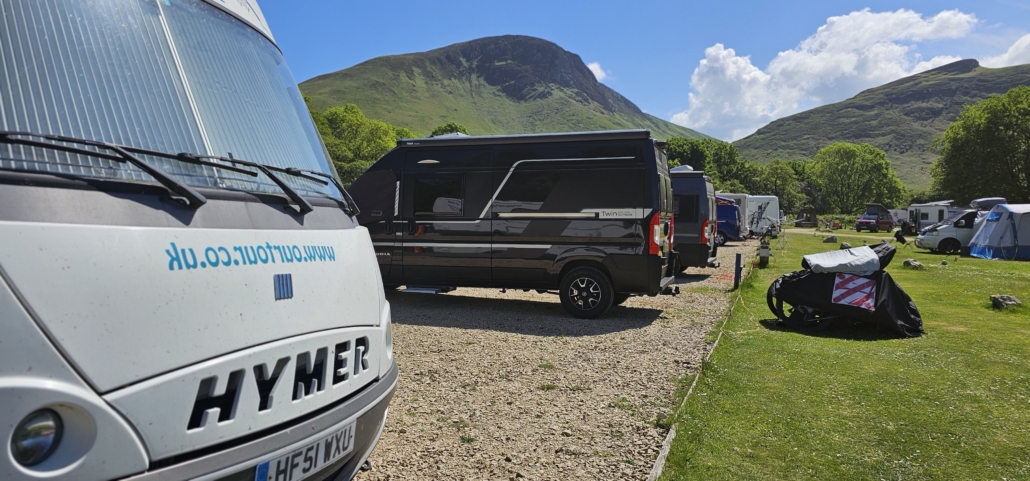 Motorhomes and campervans at Lochronza Campsite on Arran in Scotland