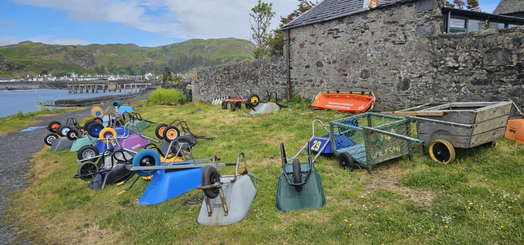 Wheelbarrows at the quayside on Easdale