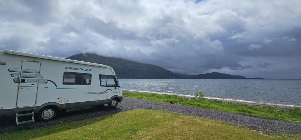 Motorhome by Loch Linnhe from the aire at Onich near Glencoe 